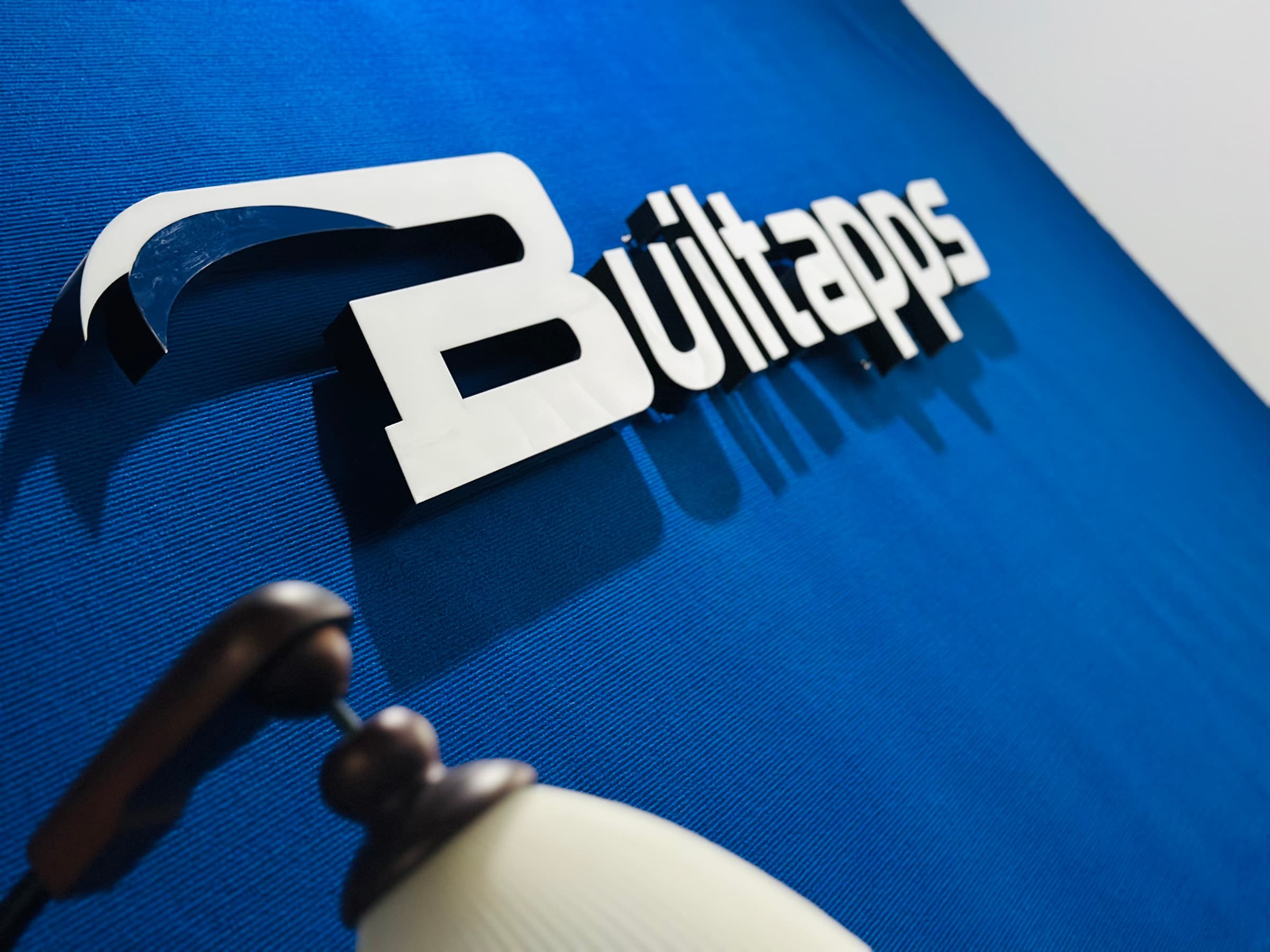 Builtapps 3D logo sign in the office