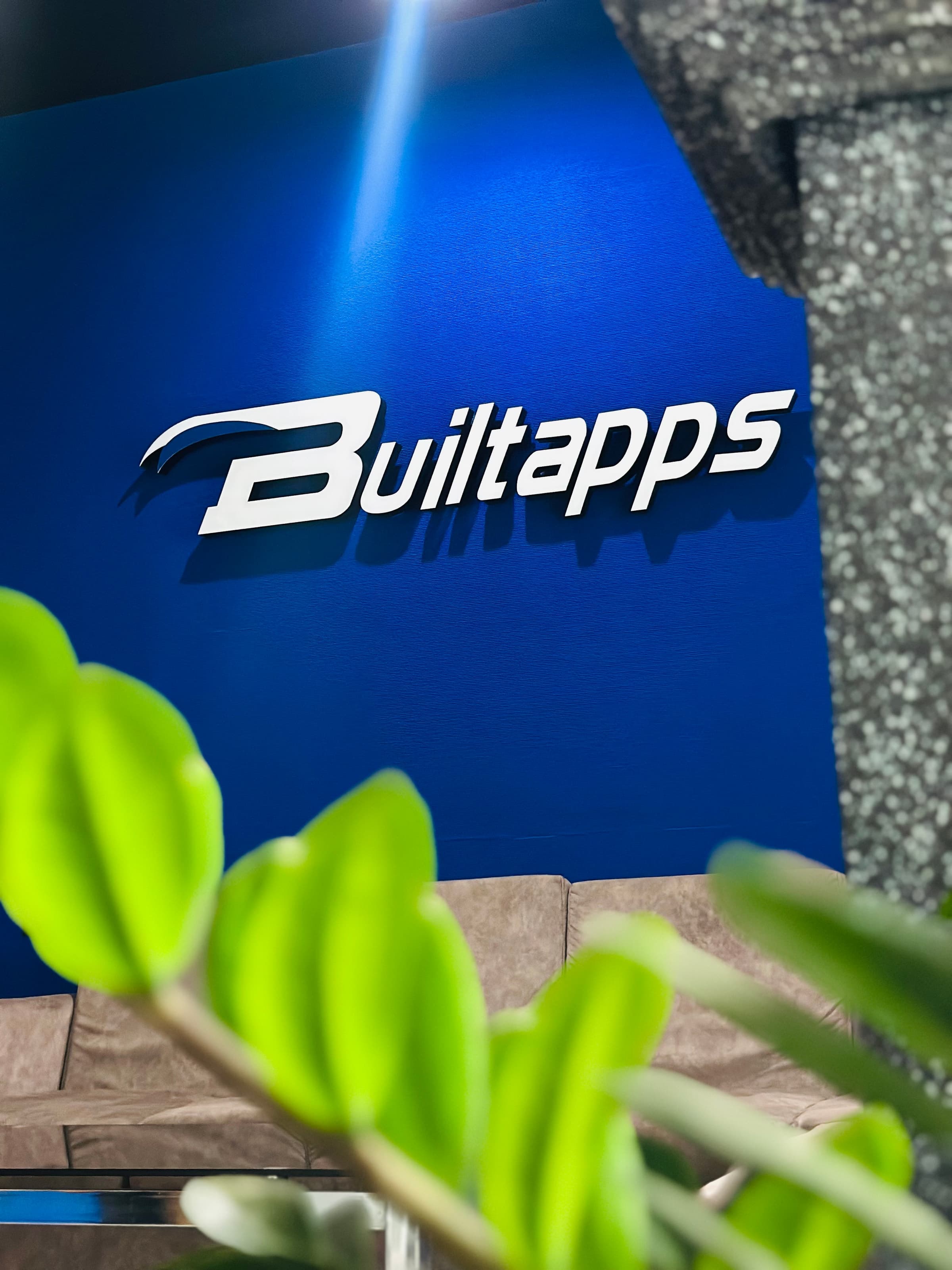 Builtapps logo in the office lobby