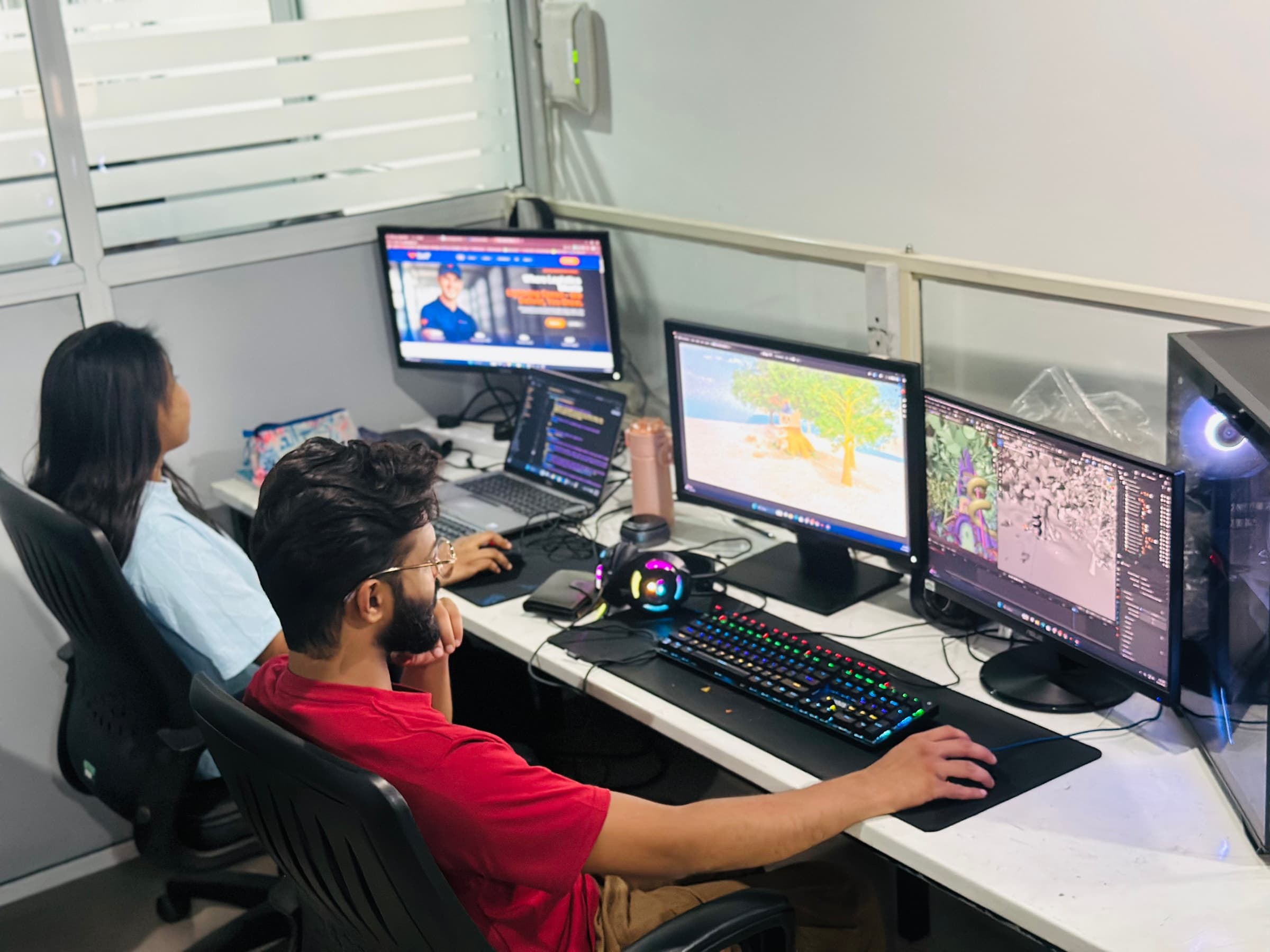 Builtapps workspace with desks, monitors, and a focused working environment